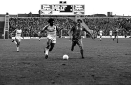 Ricky Hill gets past his marker