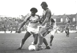 Ricky Hill goes through with the ball