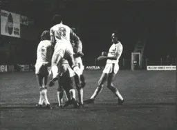 Brian Stein is mobbed after scoring the opening goal
