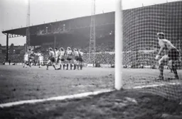 David Moss strikes the freekick towards the wall