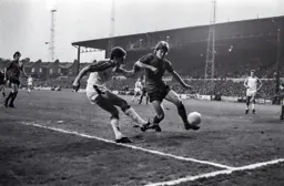 Steve White gets his cross in past Osman the Ipswich defender