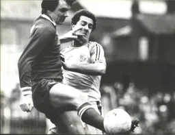 Steve White battles for the ball