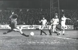 The goalkeepers feet stop this effort