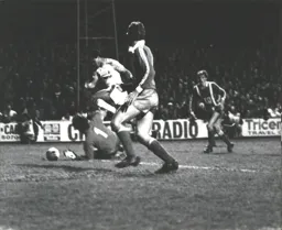 Brian Stein goes in where it hurts and is brought down for a penalty