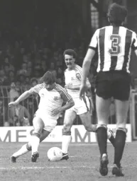 Wayne Turner attempts to move the ball forwards