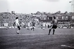Ricky Hill chips the keeper for Town’s first