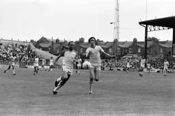 Brian Horton challenges for the ball