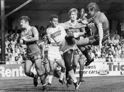 Brian Stein gets into tangle with the Brighton defence