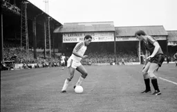 Brian Stein about to take on Gordon McQueen