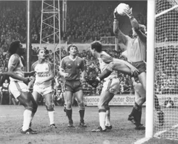 Billy Kellock makes life uncomfortable for the Forest keeper