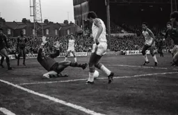 David Moss cannot get the ball past Arsenal keeper George Wood