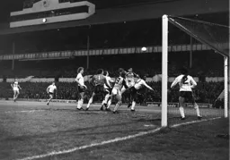 Brian Stein gets his head to the ball