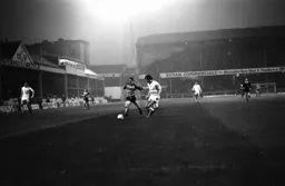 Paul Walsh goes round the Swansea defender