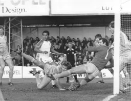 City looked to have cleared the ball as Brian Stein looks on