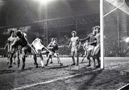 Brian Stein places Asa Hartford under pressure and he puts through his own net