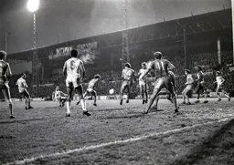 Brian Horton drives through a crowded area