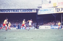 Ricky Hill in a race for the ball