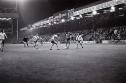 Ricky Hill takes on his defender