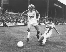Kirk Stephens leaves a defender in his wake
