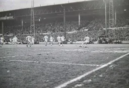 Ricky Hill about to be tackled by Steve Perryman