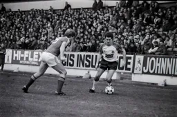 Steve White takes on a defender down the wing