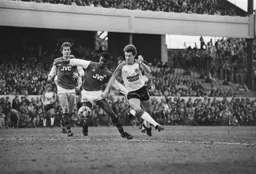 Steve White turns the defender