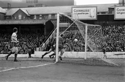 Trevor Aylott stoops at the far post to score the Town’s first