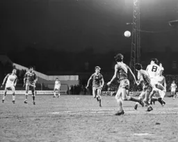 Trevor Aylott wins a header