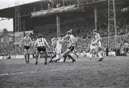Trevor Aylott weaves his way through the Stoke defence