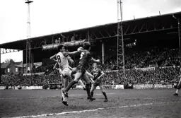 Trevor Aylott rising with the defence