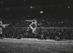 Trevor Aylott heads for goal