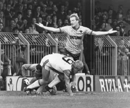 Andy Gray has no answer as Paul Walsh gets to his feet