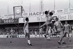 Paul Elliott heads for goal