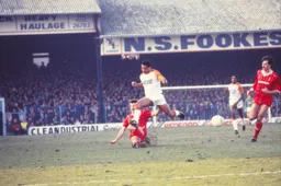 Brian Stein evades a tackle from Alan Kennedy