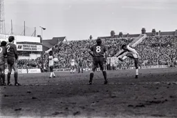 Brian Stein hits his free kick into the Liverpool wall