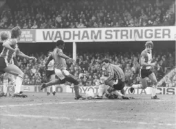 Emeka Nwajiobi moves in to reach the ball before Peter Shilton