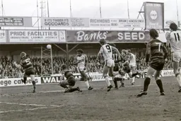 Ricky Hill gets his head to the ball