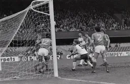 Paul Walsh watches the ball go over the bar