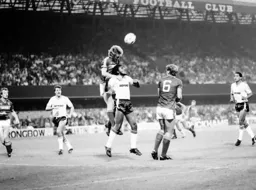 Ricky Hill outjumped by Russell Osman