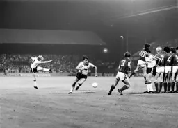 Ashley Grimes strikes a free kick into the wall