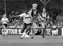 Emeka Nwajiobi gets past England centre half Mark Wright