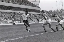 Mitchell Thomas takes on two down the wing