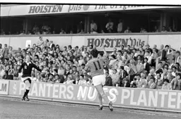 David Moss salutes to the crowd after his goal