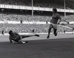 David Moss slips the ball past Ray Clemence for the first goal