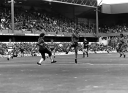 Brian Stein avoids a meaty clearance