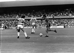 David Moss takes on the Rangers defender