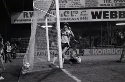 Steve Elliott follows the ball into the net from the own goal