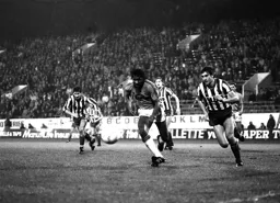 Ricky Hill drives through the midfield