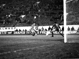 Vince Hilaire has a strike from the edge of the box