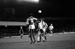 Steve Foster gets stuck in with Tony Adams